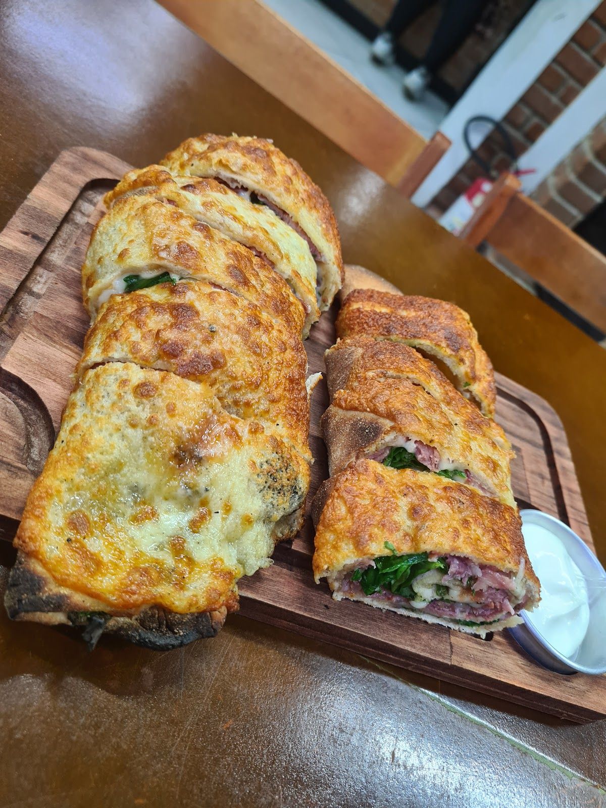 Pizza enrolada na tábua